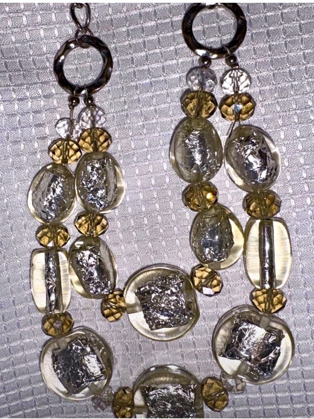 silver toned cable chain beaded necklace. clear glass lobster adjustable